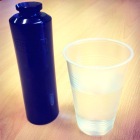 This blue bottle illustrates the volume of high level waste that would result from one person's entire lifetime of energy use, if they used nothing but nuclear power.